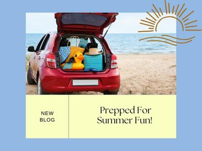 Beach and ocean with red car prepped for summer fun and packed with summer essentials